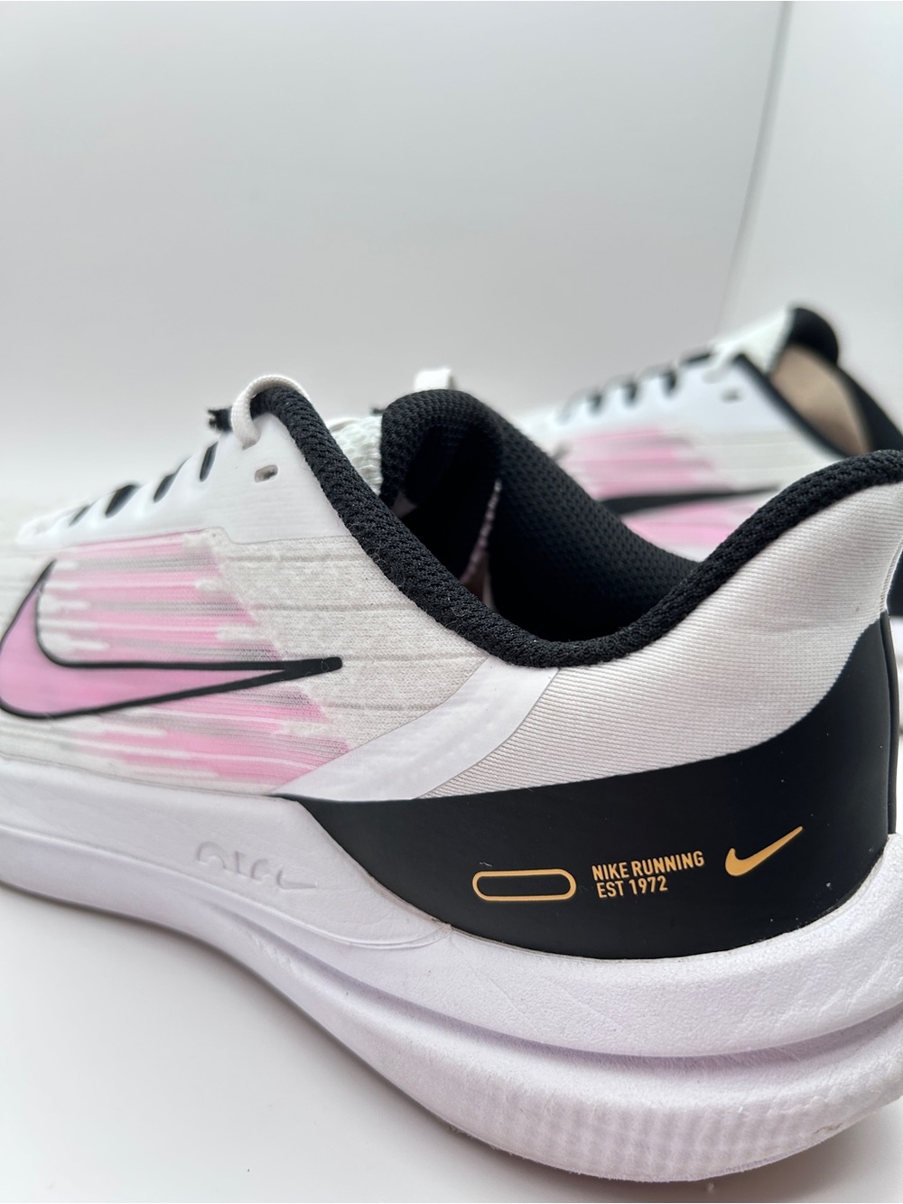 Nike Women’s White and Pink Running Shoes with Black Accents - Picture 2 of 6